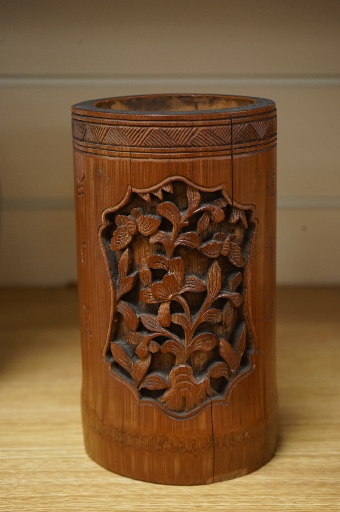 A Chinese carved bamboo vase, 19cm high